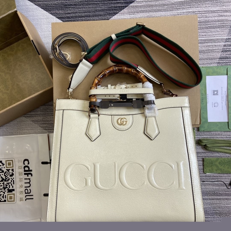 G*u*i top handle bags